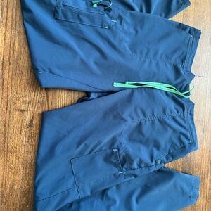 Carhartt Men's Dark Blue Cargo Pants with Green Details
